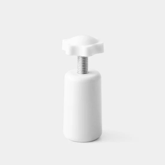 Prensa para colocar las tapas de los perfumes